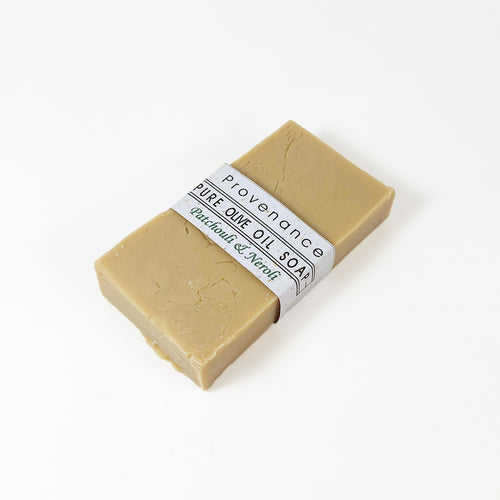 Brick-shaped bar of handmade pure olive oil soap.