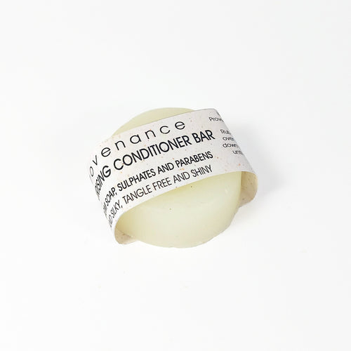 Small, white, round conditioner bar.