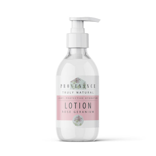 Lotion in clear glass bottle with pump.