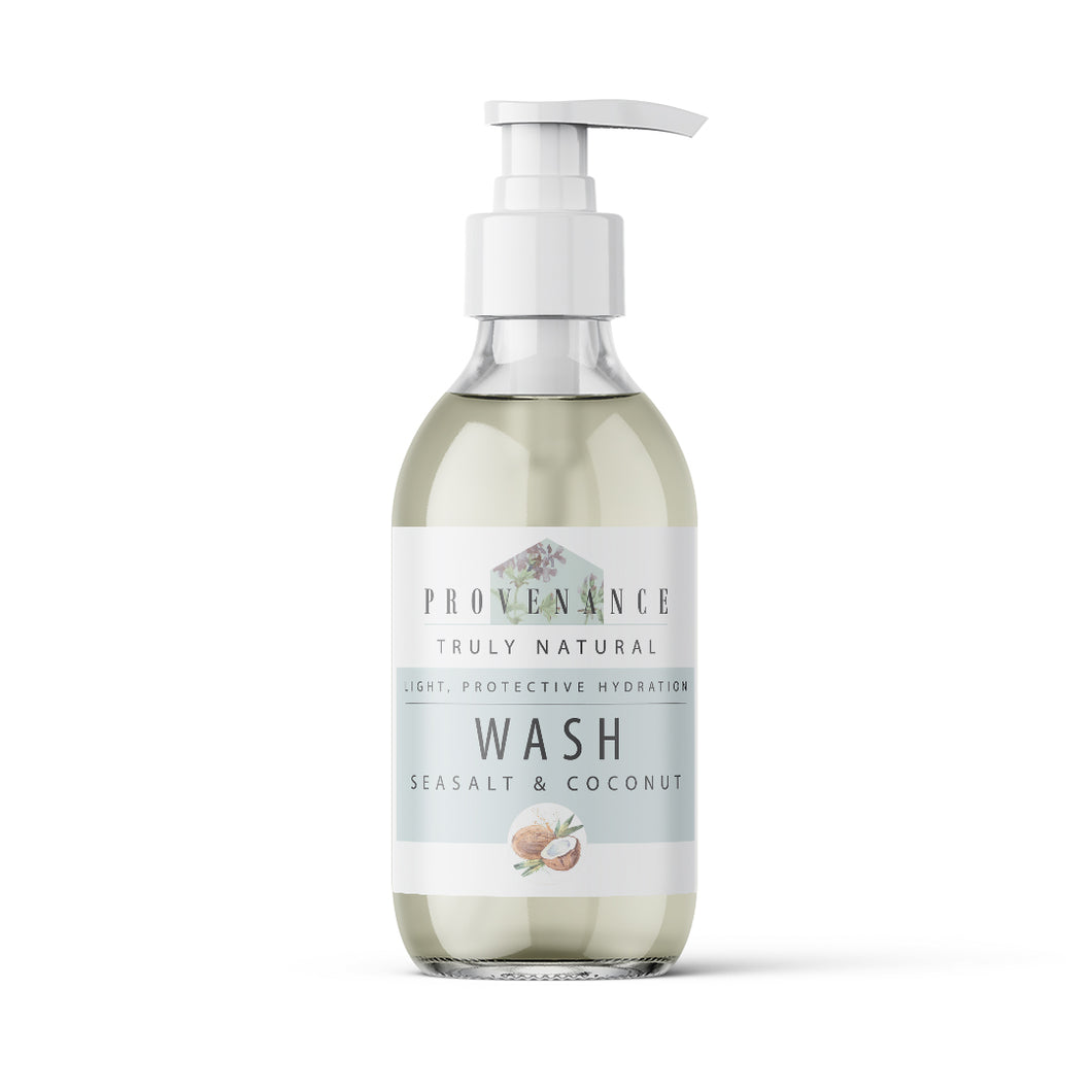 Hand wash in clear glass bottle with pump.