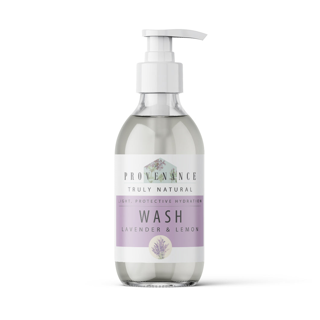 Hand wash in clear glass bottle with pump.