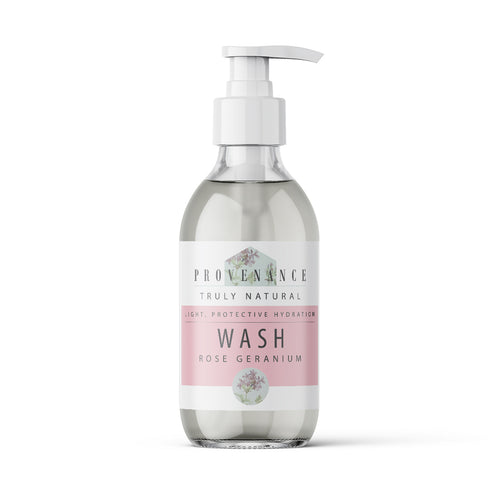 Hand wash in clear glass bottle with pump.