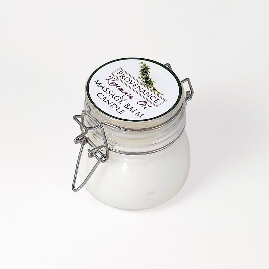 Massage balm candle in clear glass jar with confectionary clamp lid.