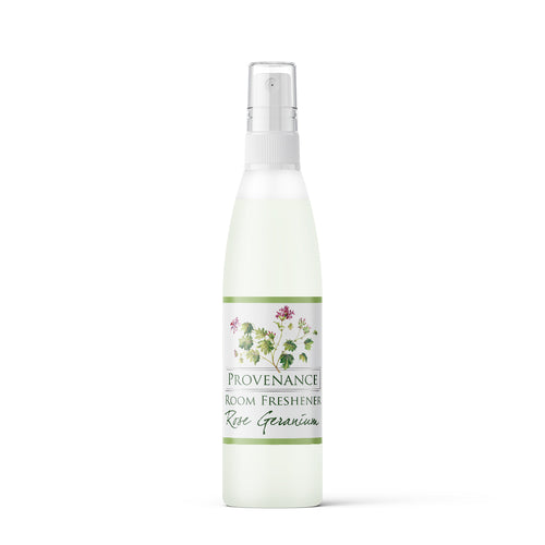 Room freshener in tall frosted cosmetics bottle with spray nozzel screw-top lid.